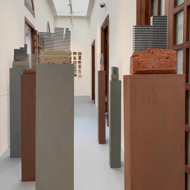 Installation View, Staple pins and cement sculptures